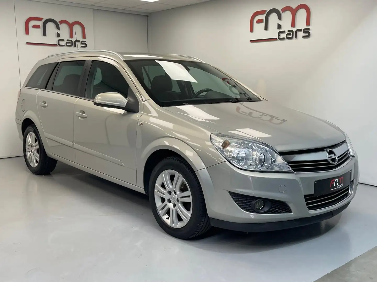 Opel Astra 1.7 CDTi 1ste eigenaar Navi Cruise Pdc Garantie Zilver - 1