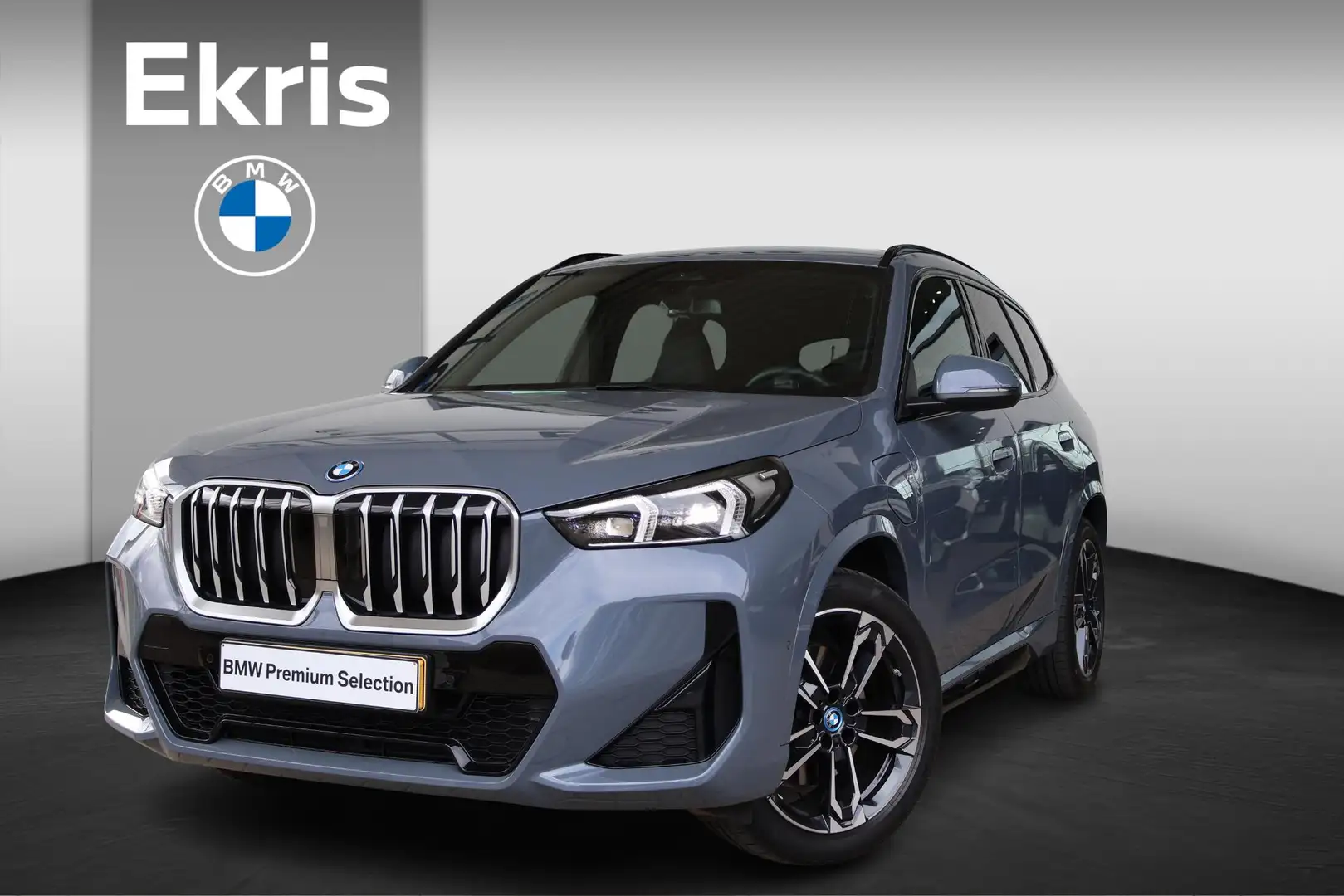 BMW X1 xDrive25e M Sportpakket | Premium Pack | Driving A Grijs - 1