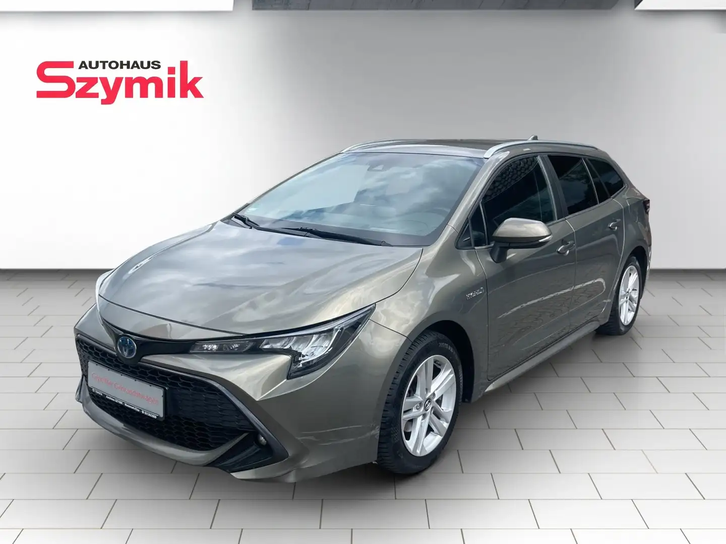 Toyota Corolla 1.8 Hybrid TS Smart Bronze - 1