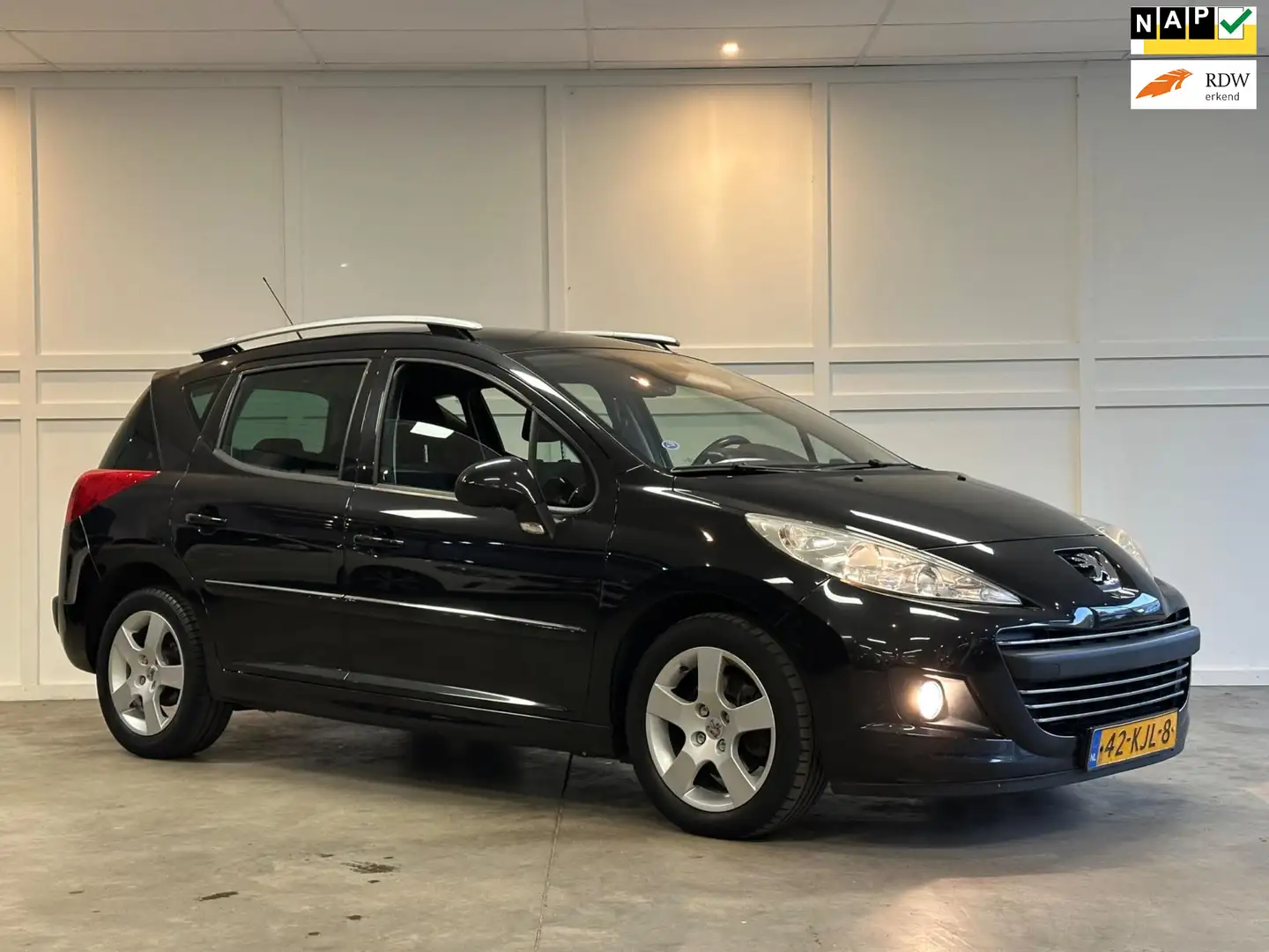 Peugeot 207 SW 1.6 VTi Première / Navi / Cruise / Panorama / Noir - 1