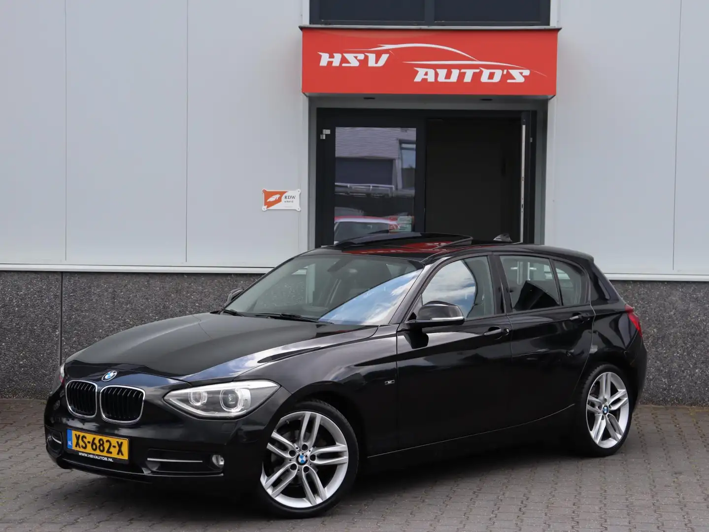 BMW 116 1-serie 116i EDE Business+ navi leer xenon LM Zwart - 1