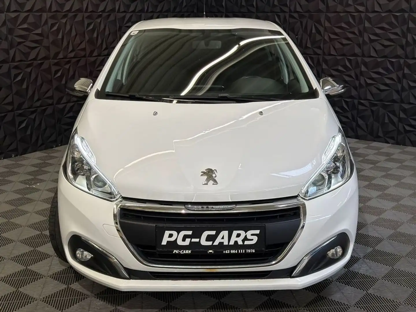 Peugeot 208 1.2 e-VTi Style Weiß - 2