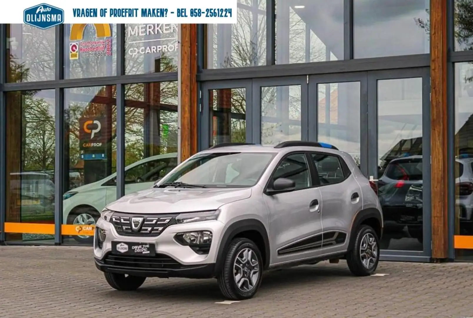 Dacia Spring Comfort Plus 27 kWh|CCS|Navi|Camera|Leer|Airco Plateado - 1