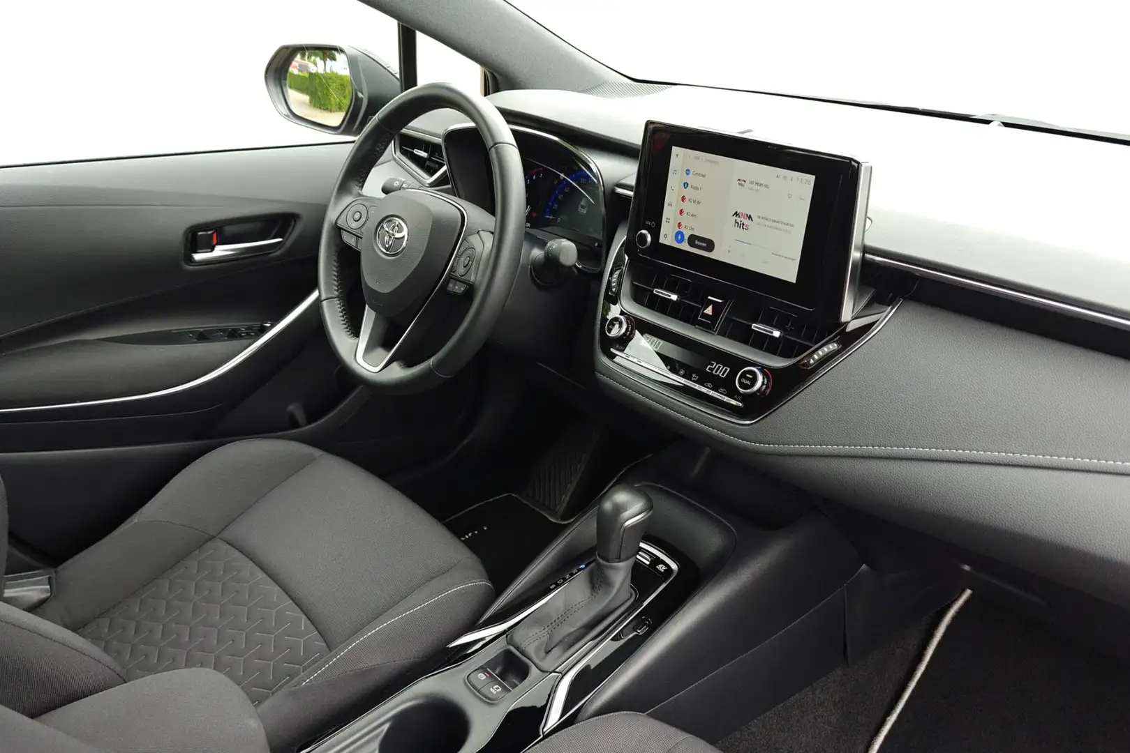 Toyota Corolla 1.8 Hybrid Dynamic e-CVT - incl 2 jaar KARE Noir - 2
