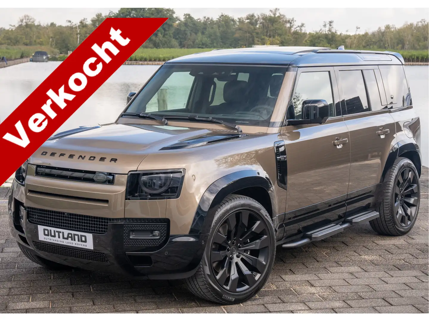 Land Rover Defender P300e 110 X-Dynamic HSE | VERKOCHT | Gondwana Ston Bruin - 1