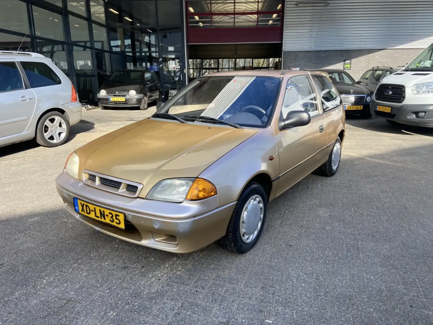 Suzuki Swift 1.0 GLS Fortune Galben - 1