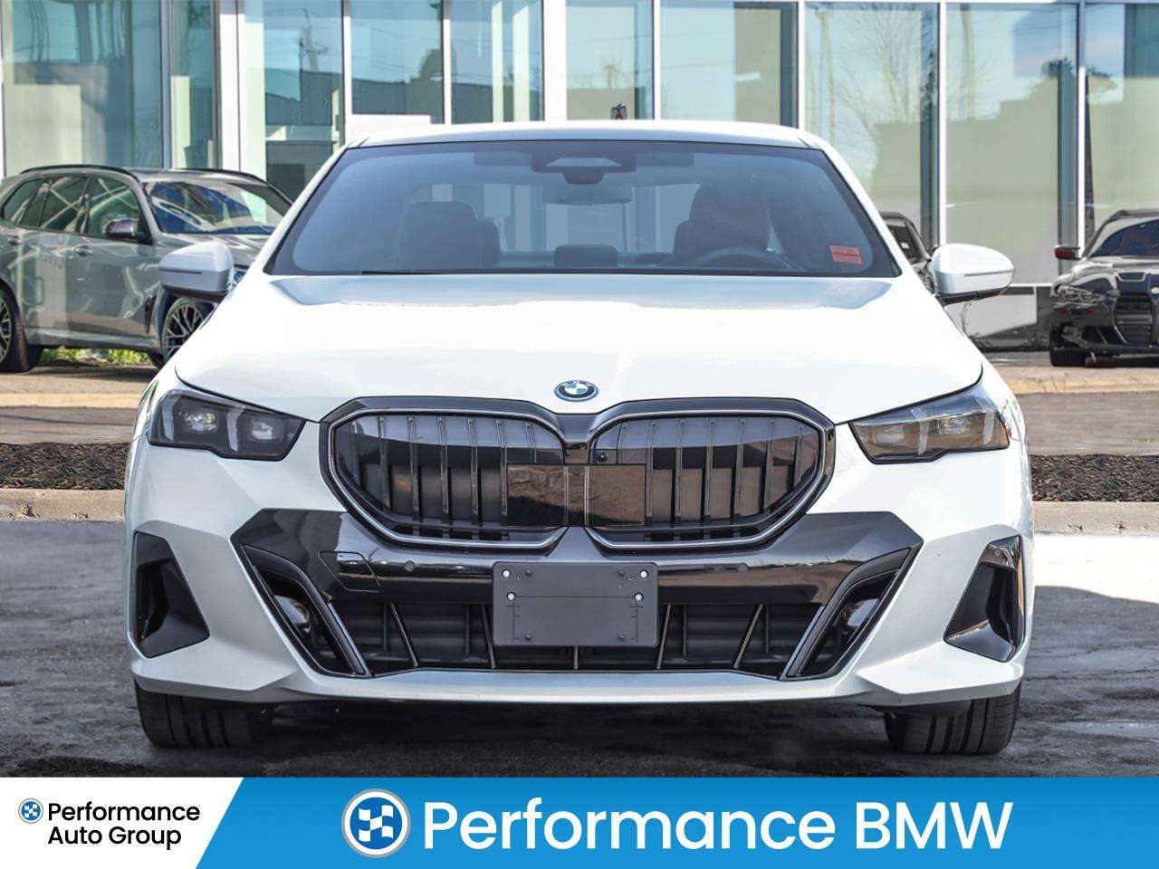 2026 BMW 5 Series 550e xDrive alt 4