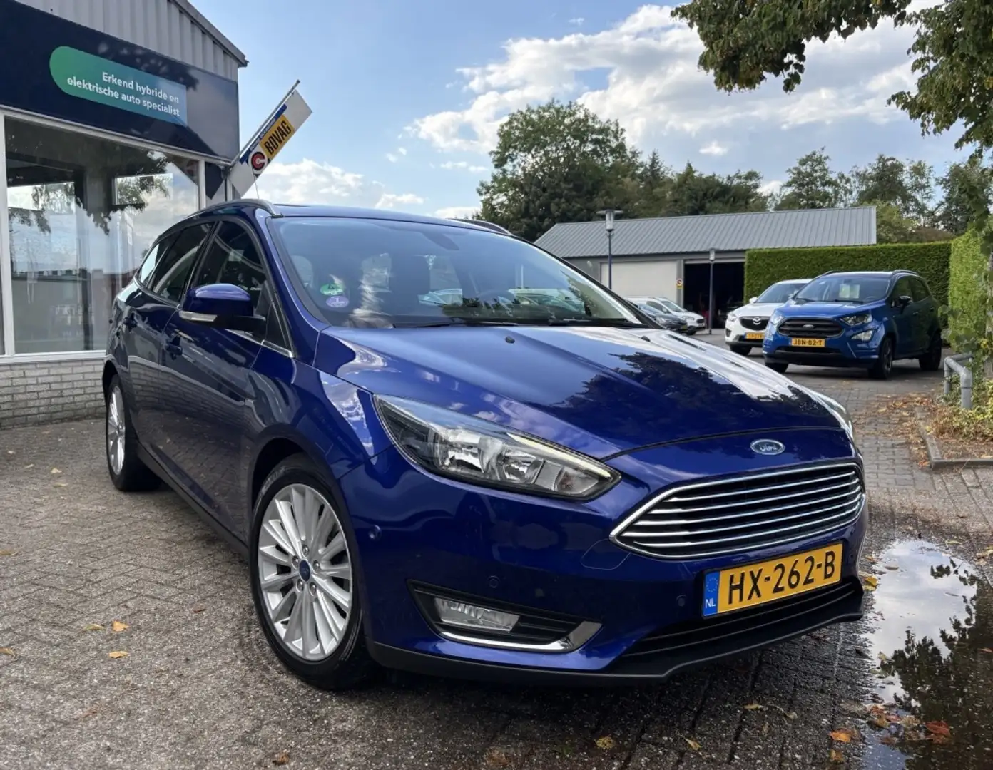 Ford Focus Wagon 1.0 Titanium NAVI / PDC / TREKHAAK / NWE. D- Blauw - 2