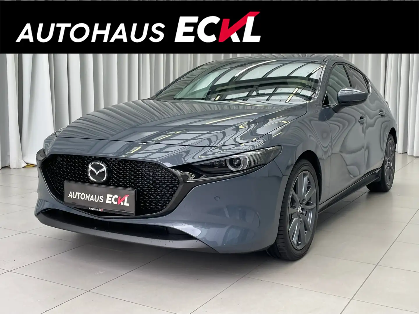Mazda 3 G140PS 6MT 2WD 2.5L  EXCLUSIVE - LINE 2488ccm Gris - 1