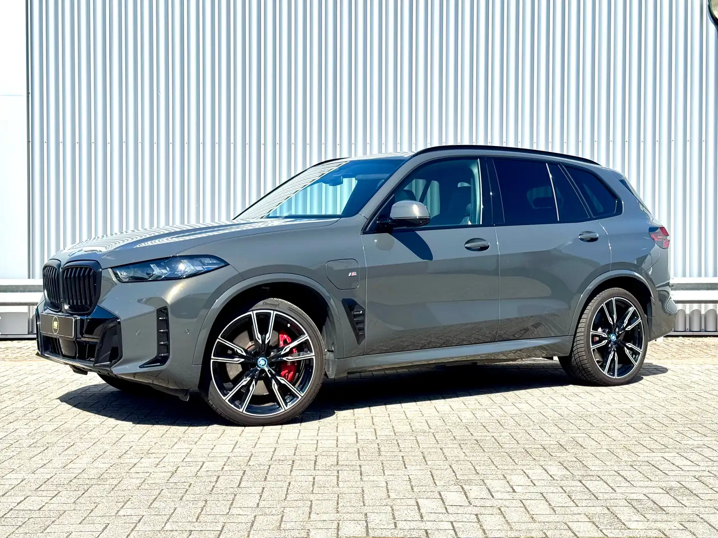 BMW X5 xDrive50e M Sport Pro | M stoel | Skylounge | 22" Gris - 1