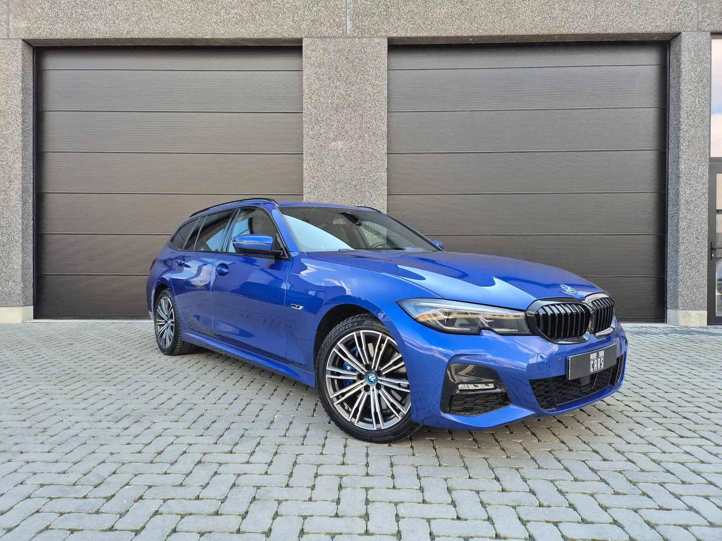 BMW 330 e xDrive touring M-sport Laser 360cam HUD ACC HIFI Blauw - 1