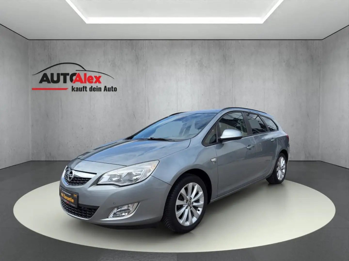 Opel Astra 1.4 Turbo Sports Tourer 150 Jahre Plateado - 1