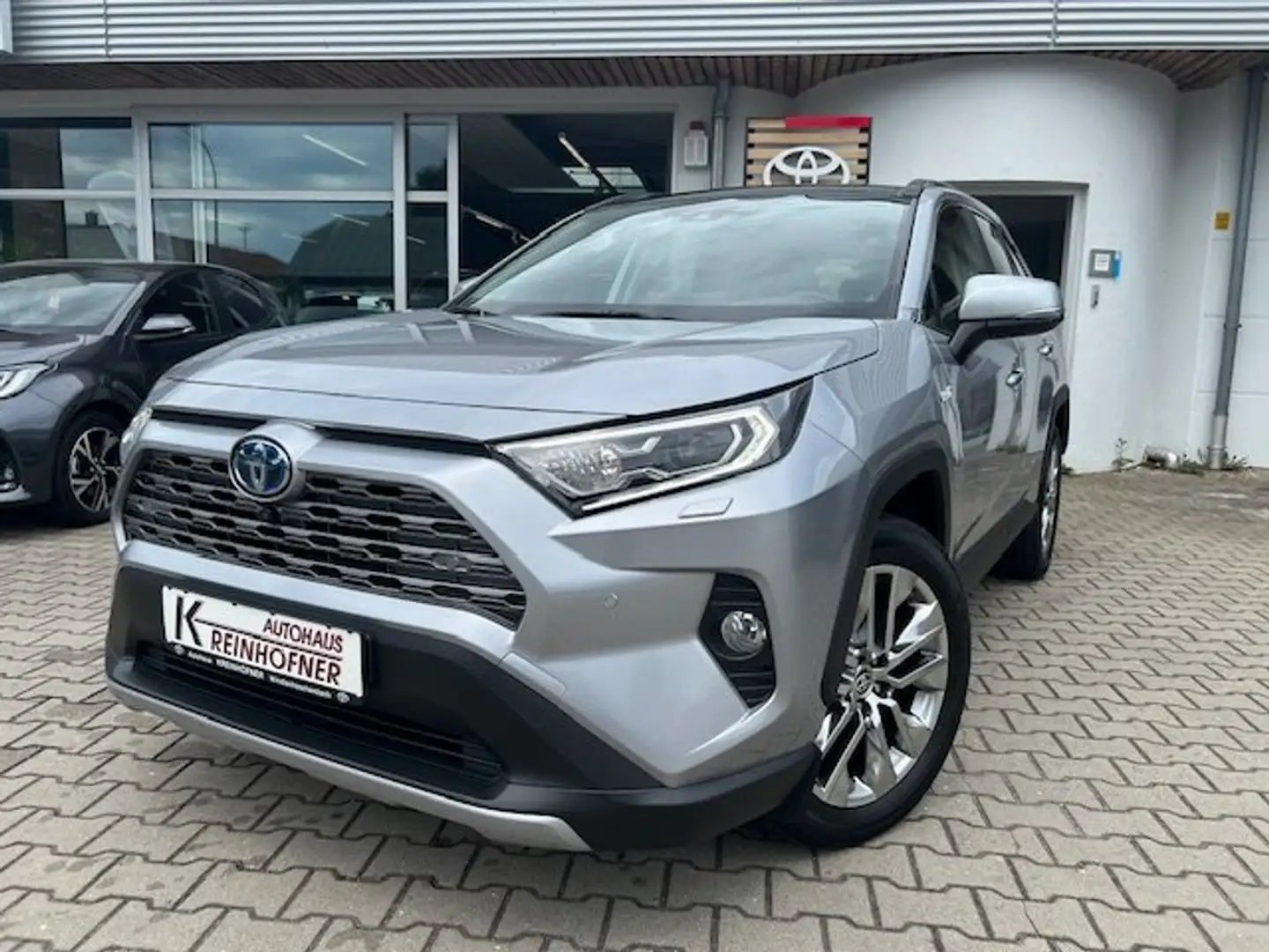 Toyota RAV 4 2.5 4x4 Hybrid Lounge *Panorama* Silber - 1