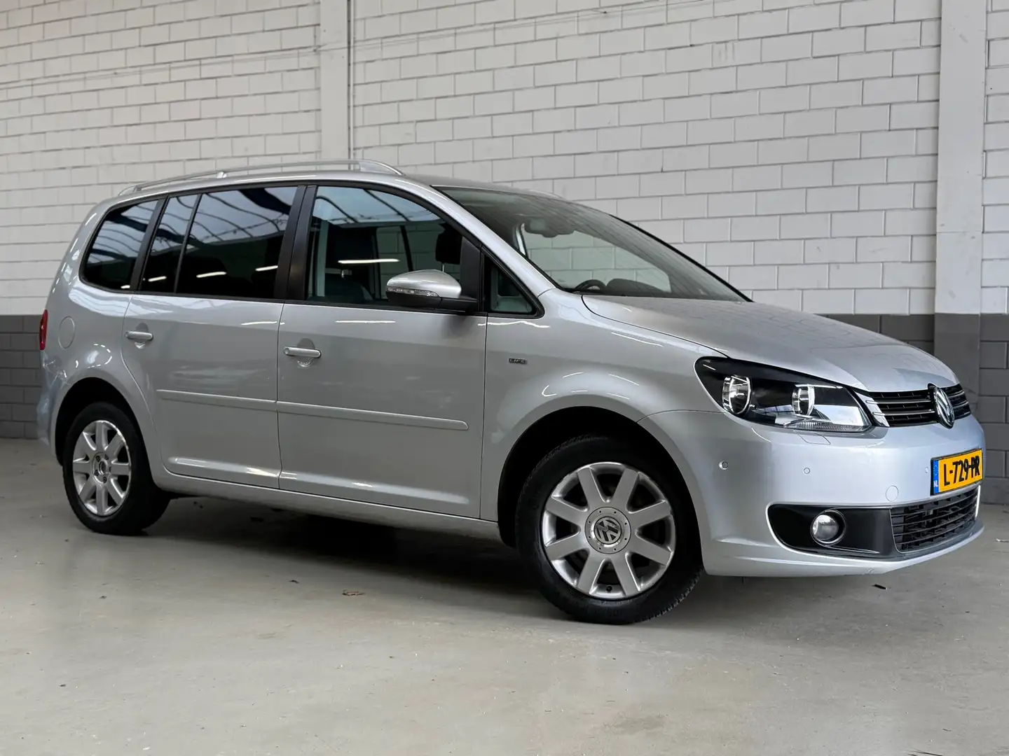 Volkswagen Touran 1.2 TSI Comfortline BlueMotion 7p. Zilver - 1