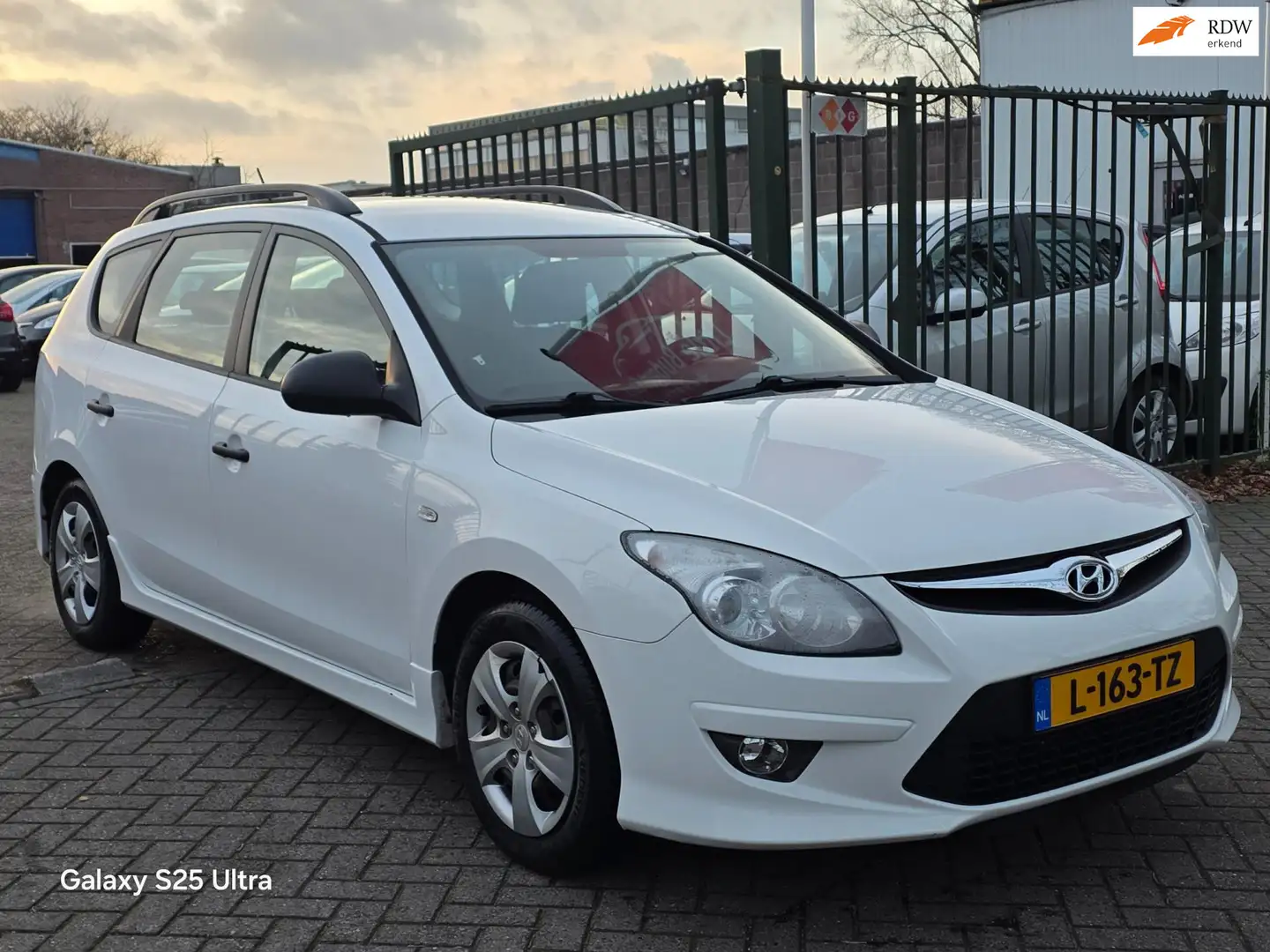 Hyundai i30 CW 1.4i i-Drive Airco elektrische ramen cv op afs Wit - 1