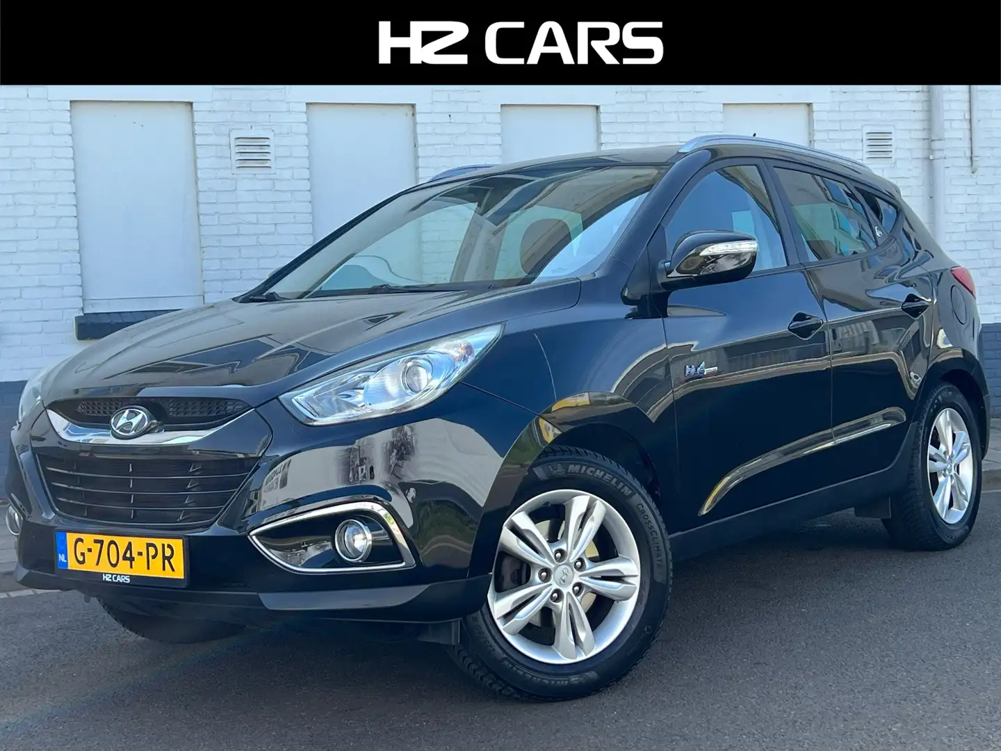 Hyundai iX35 1.6i GDI Business Edition|Camera|Trekhaak|Navi|Cru Noir - 1