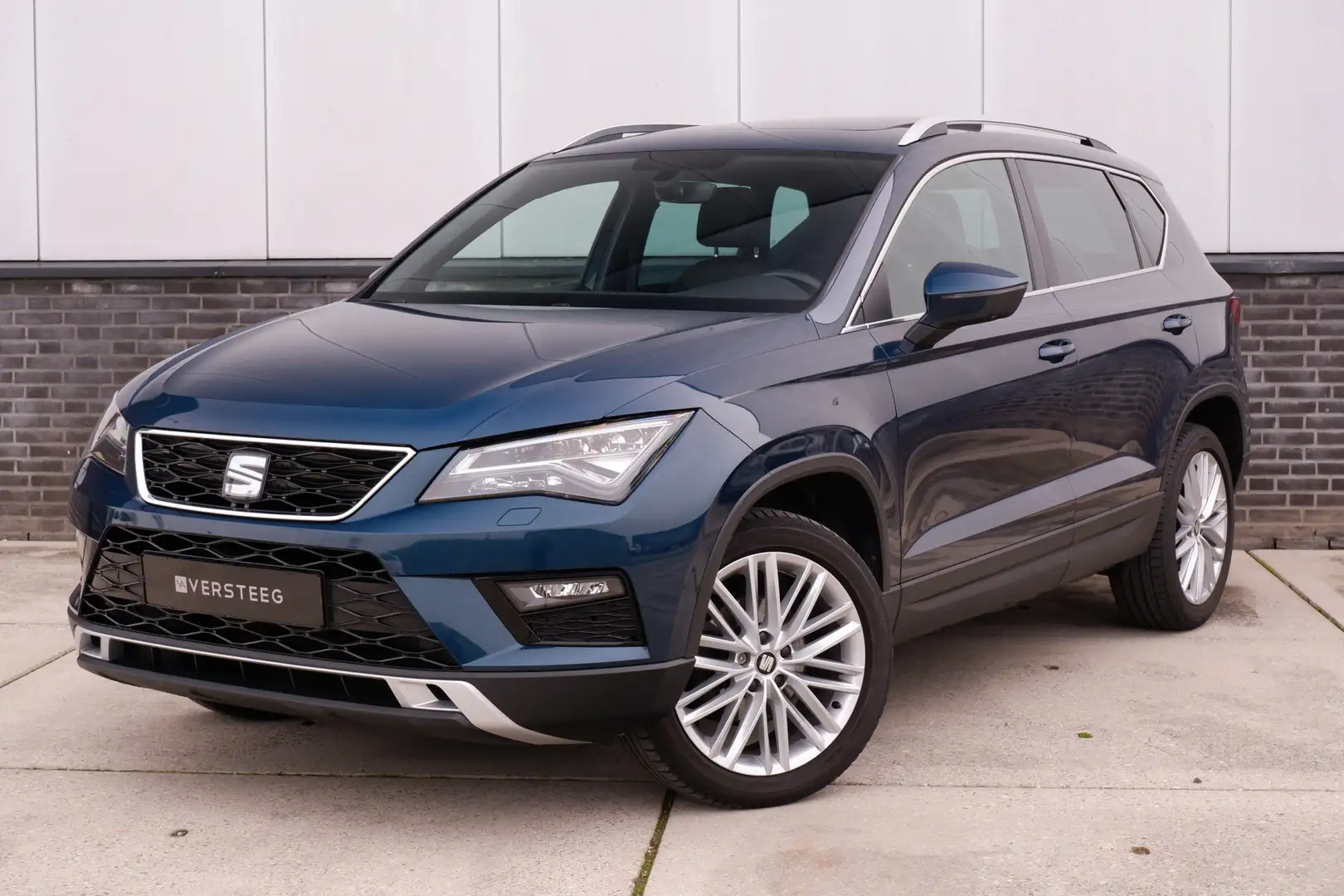 SEAT Ateca 1.5 TSI Xcellence | Panorama | LED | Navi | Alcant Blauw - 1