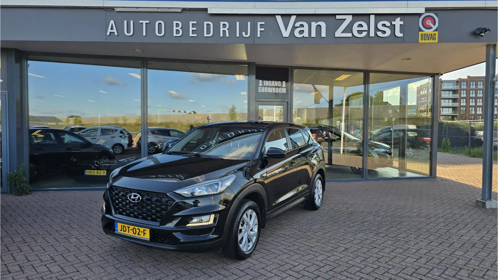 Hyundai TUCSON 1.6 GDI Comfort* 6 Bak*Navigatie*Airco (Automatisc Zwart - 1