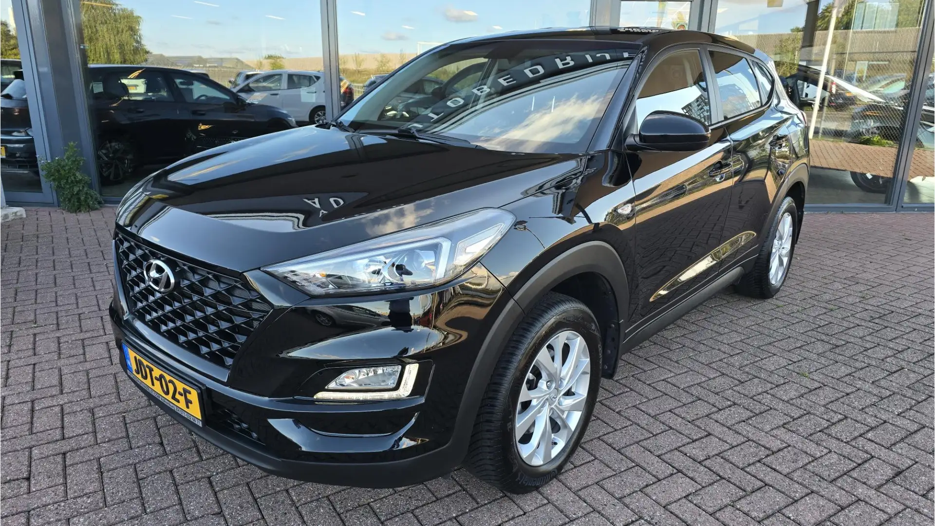 Hyundai TUCSON 1.6 GDI Comfort* 6 Bak*Navigatie*Airco (Automatisc Zwart - 2