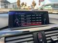 BMW 320 3-serie 320i High Executive AUT|Leder|Cruis|NAVI|D Schwarz - thumbnail 21
