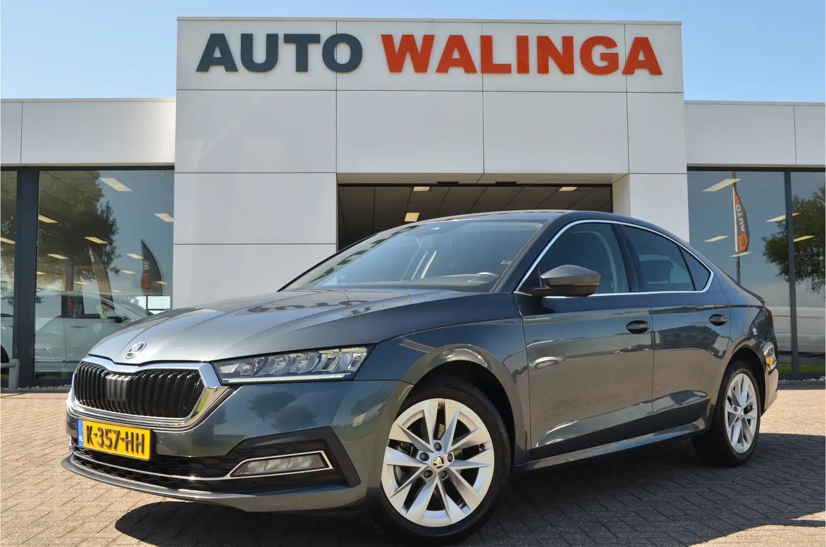 Skoda Octavia 1.0 TSI Business Edition Trekhaak elektr | Carplay Grijs - 1