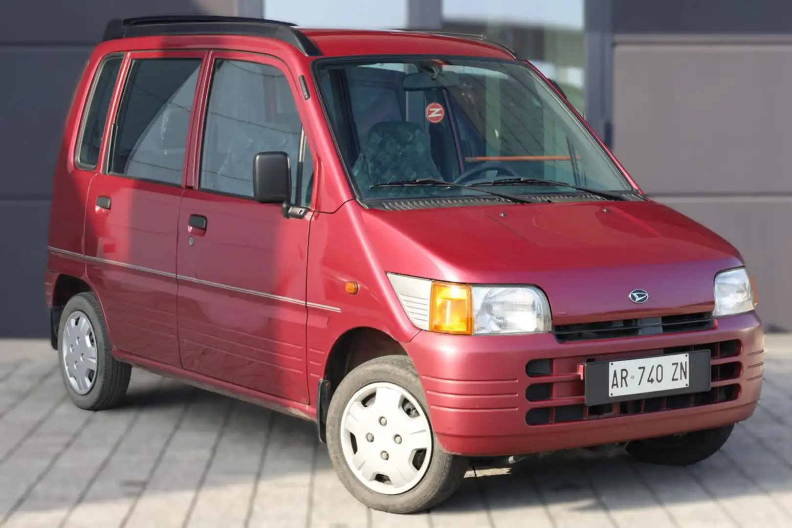 Daihatsu Move 847i cat Rood - 1