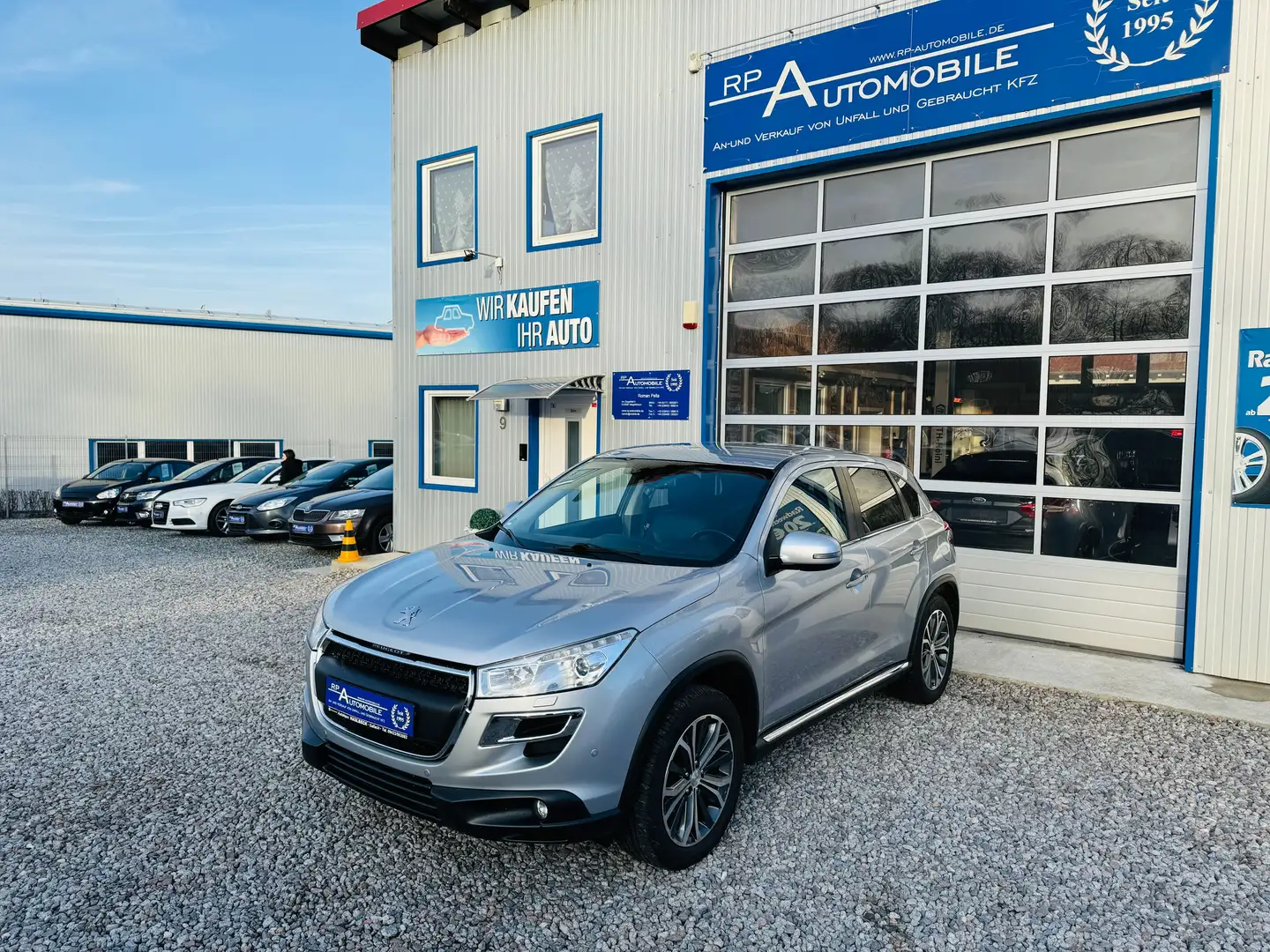 Peugeot 4008 Allure 4WD AHK PDC KAM NAVI BT SITZHZG KLIMAAUT Silber - 1