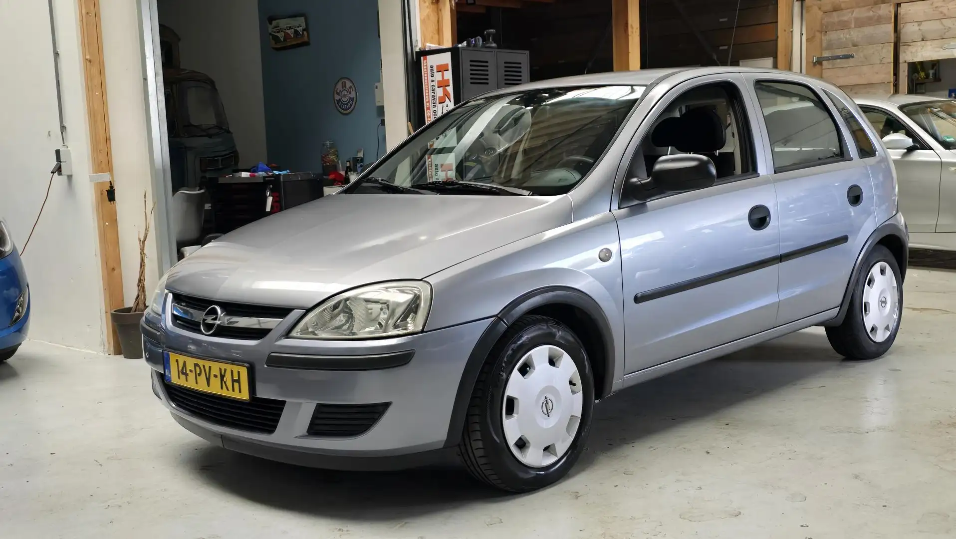 Opel Corsa 1.2-16V Rhythm 5drs Blutooth, Cruisecontrole, DAB. Grigio - 1