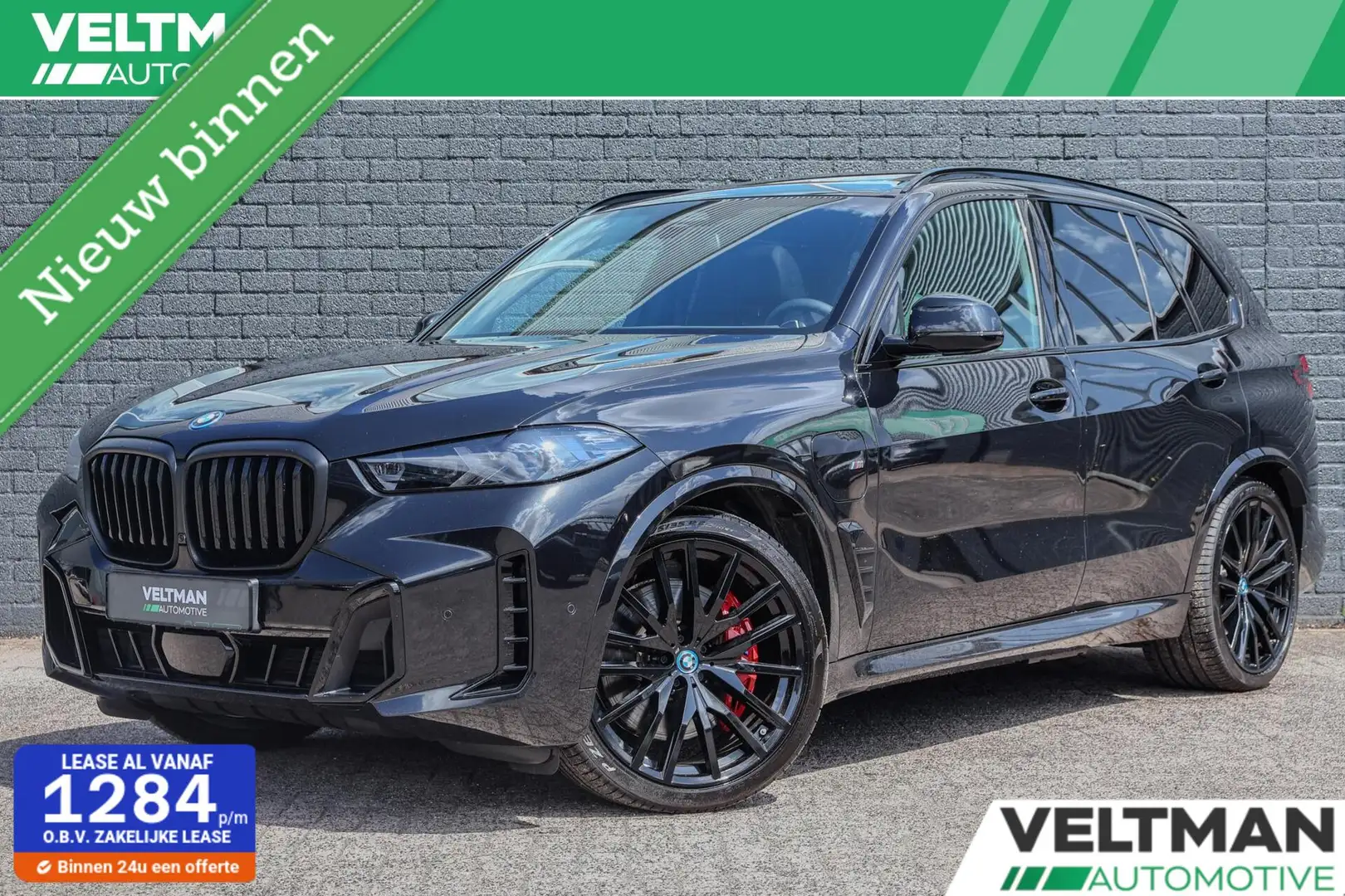 BMW X5 xDrive50e M-SPORT PANO TREKHAAK HARMAN KARDON 22IN Zwart - 1