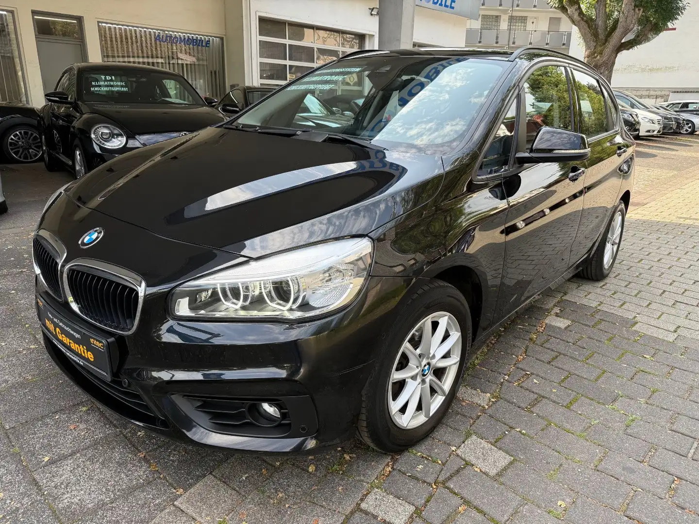 BMW 218 i Active Tourer,Navi,LED,Klimaau.,PDC v&h Schwarz - 1