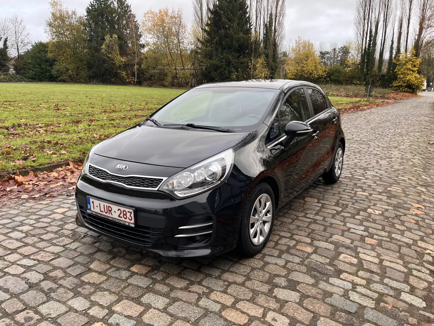 Kia Rio 1.2 ISG World Edition Zwart - 1