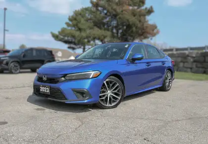 Blue 2023 Honda Civic Touring FWD Sedan Front-Wheel Drive Continuously Variable Transmission