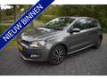 Volkswagen Polo 1.2 TSI Comfortline AUTO. LUXE 145DKM Grijs - thumbnail 1