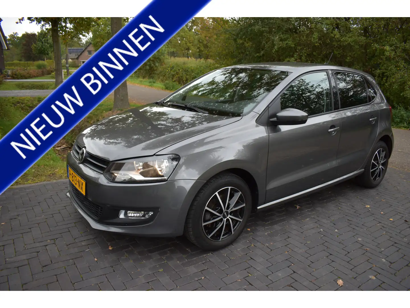 Volkswagen Polo 1.2 TSI Comfortline AUTO. LUXE 145DKM Grijs - 1