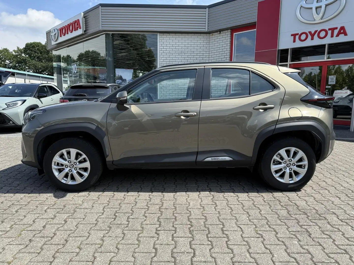 Toyota Yaris Cross HYBRID 115 DYNAMIC NAVI STOELVERW EL-KLEP KEYLESS Groen - 2