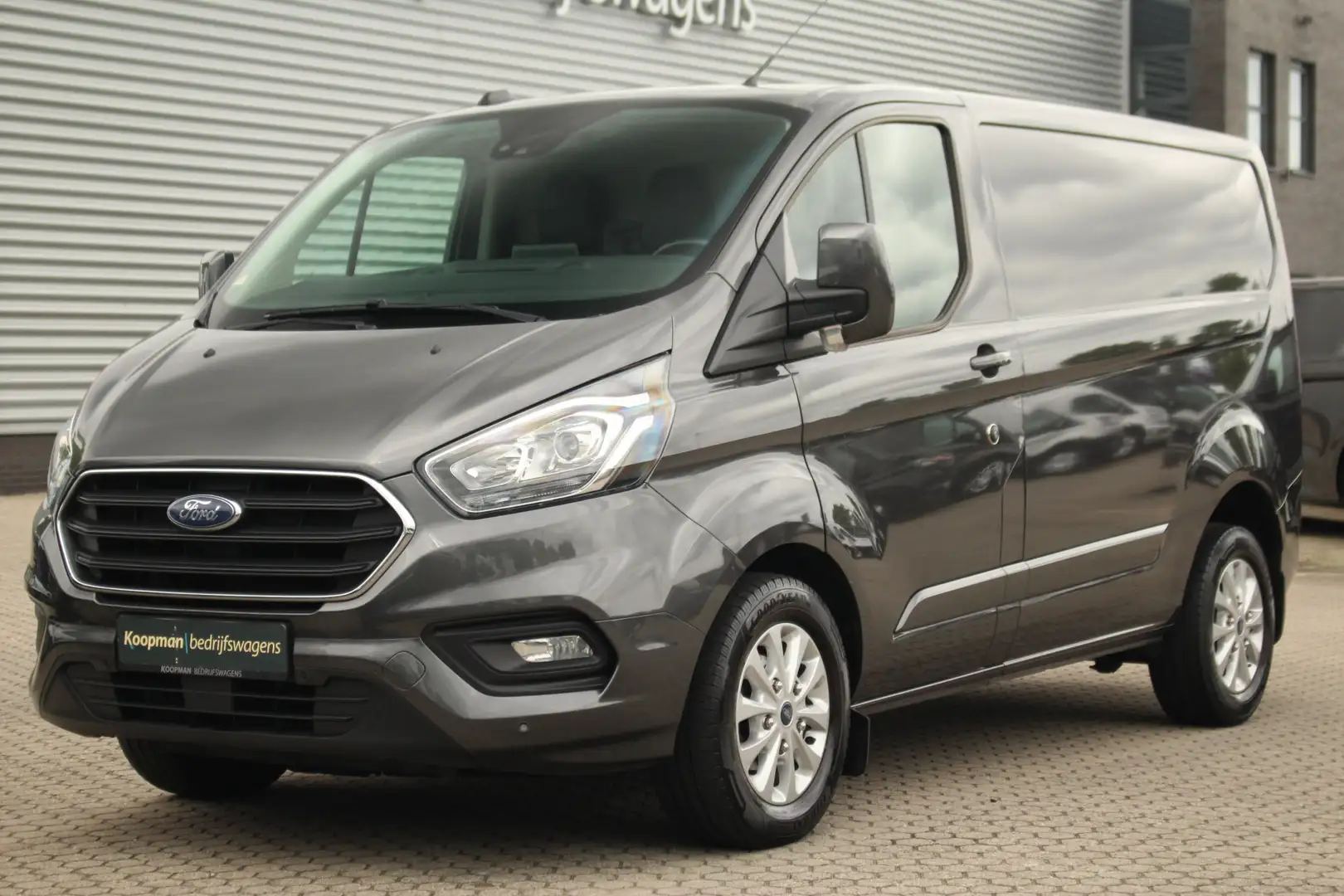 Ford Transit Custom 280 2.0TDCI 130pk L1H1 Limited | Automaat | Trekha Grijs - 2