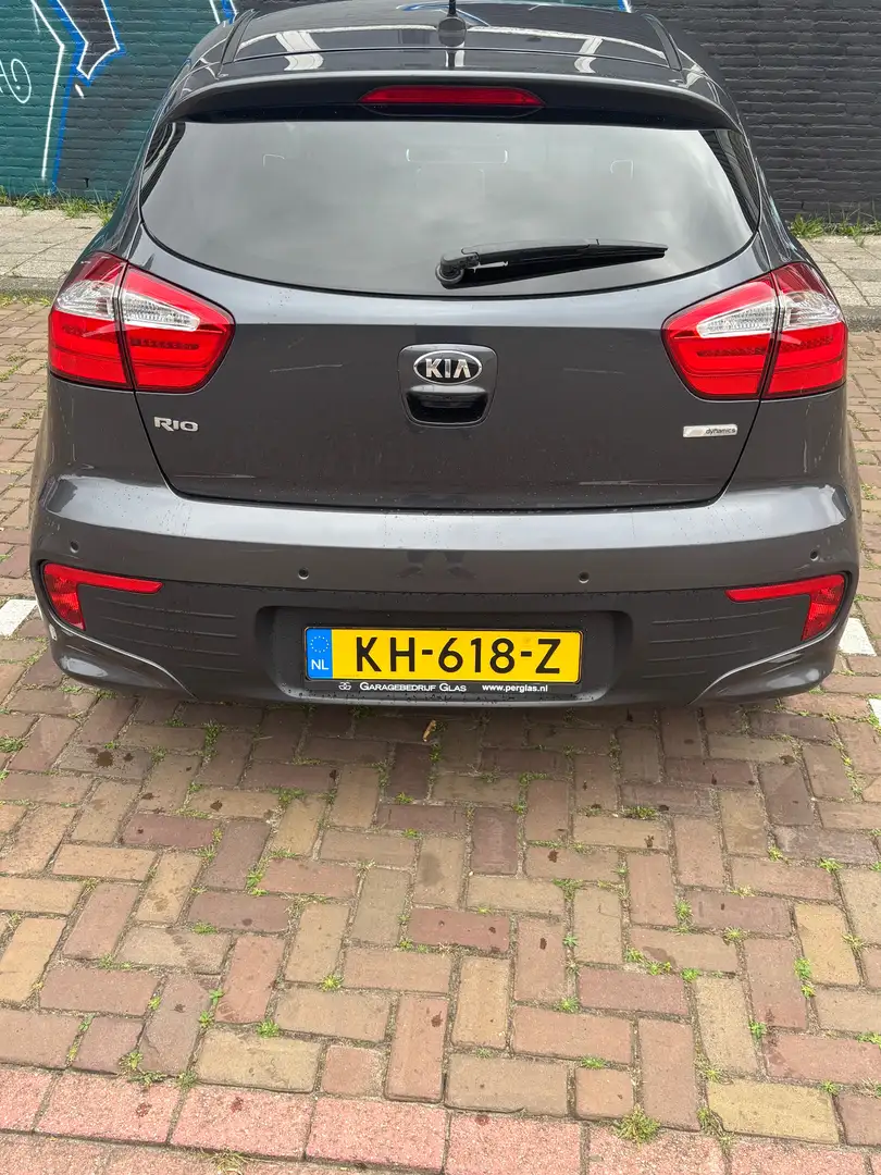 Kia Rio Rio 1.2 CVVT ExecutiveL. Grijs - 1
