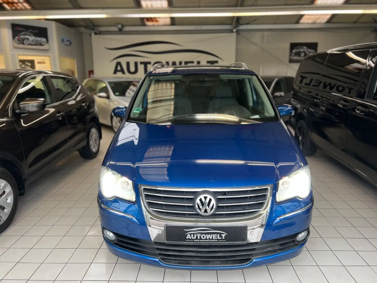 Volkswagen Touran Highline*TÜVneu*Sitz-H*Klima*S-Dach*Navi* Blau - 2