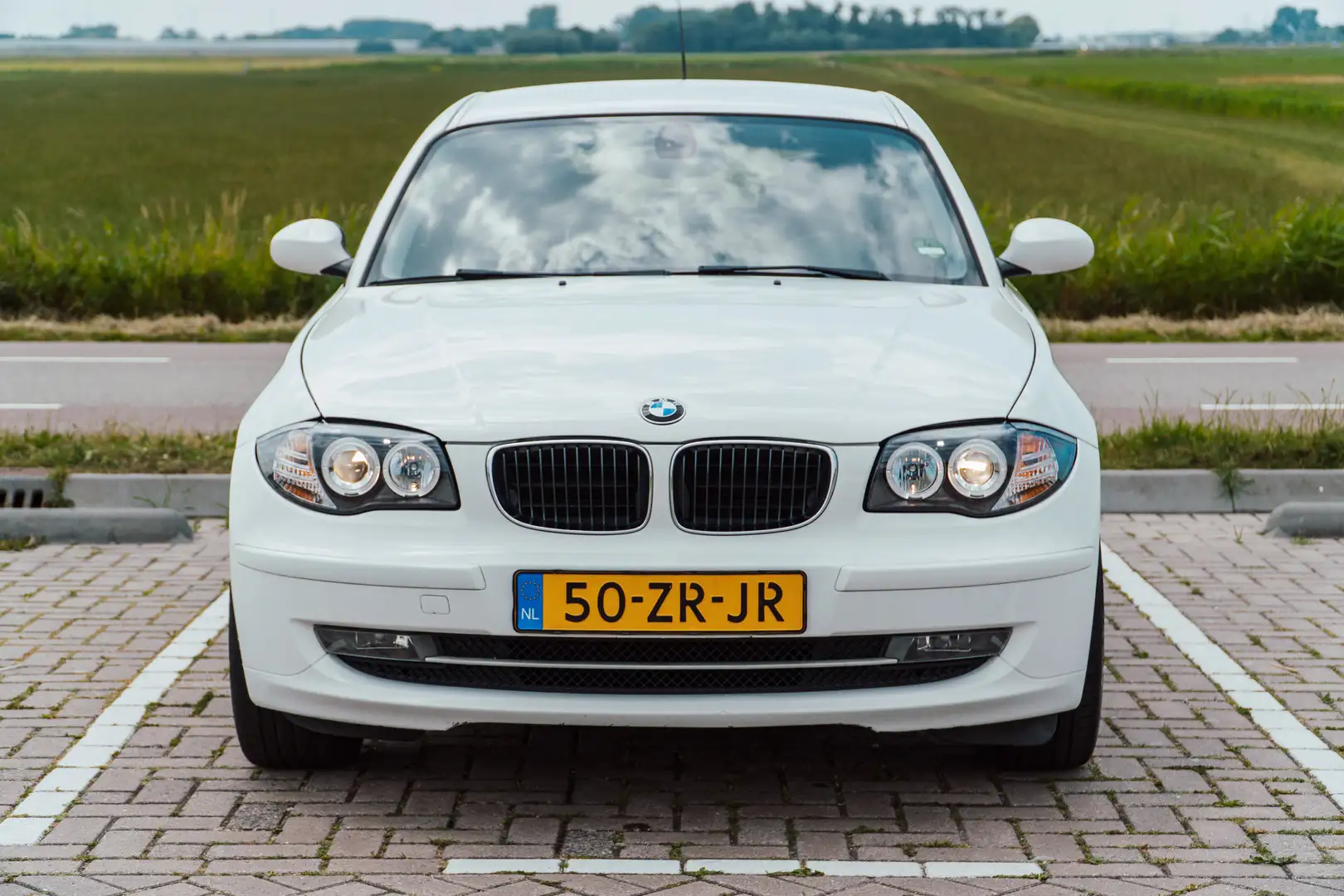 BMW 116 i Business Line / 5DR / NL auto Wit - 2
