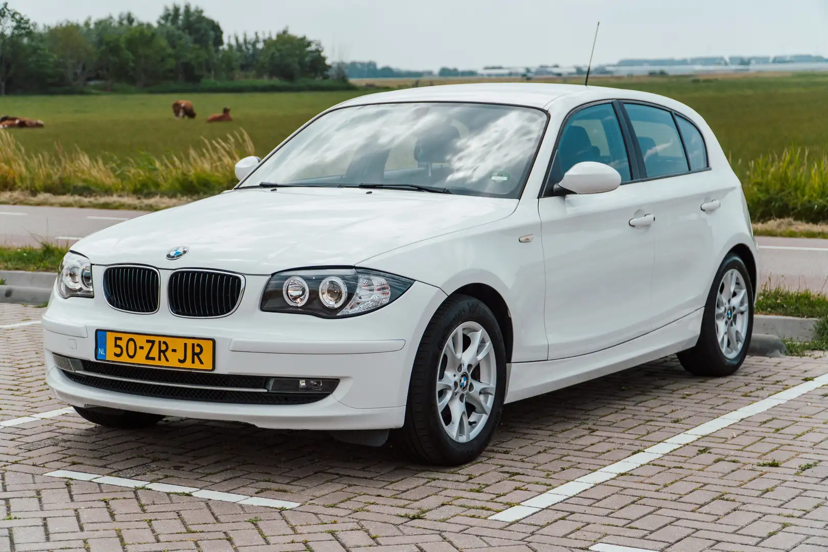 BMW 116 i Business Line / 5DR / NL auto Wit - 1