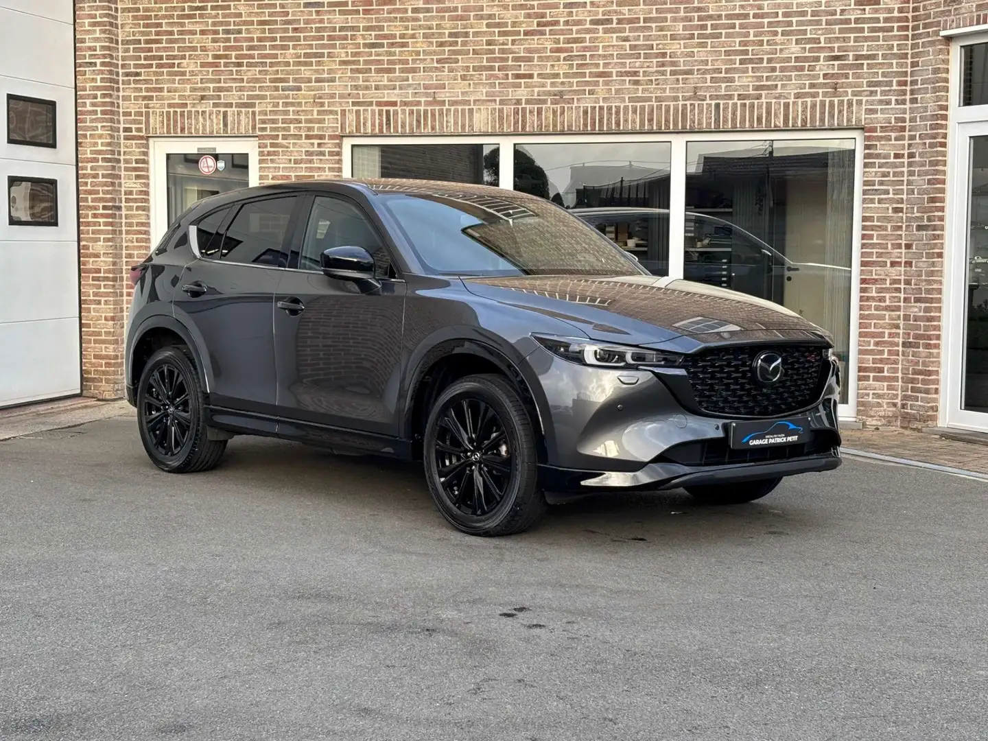 Mazda CX-5 CX-5 2.0 M-HYBRID HOMURA / Automaat / Trekhaak Grijs - 1