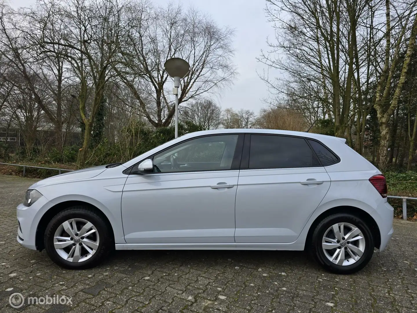 Volkswagen Polo 1.0 TSI Beats. Pdc voor en achter. Parkeer assiste Blanc - 2