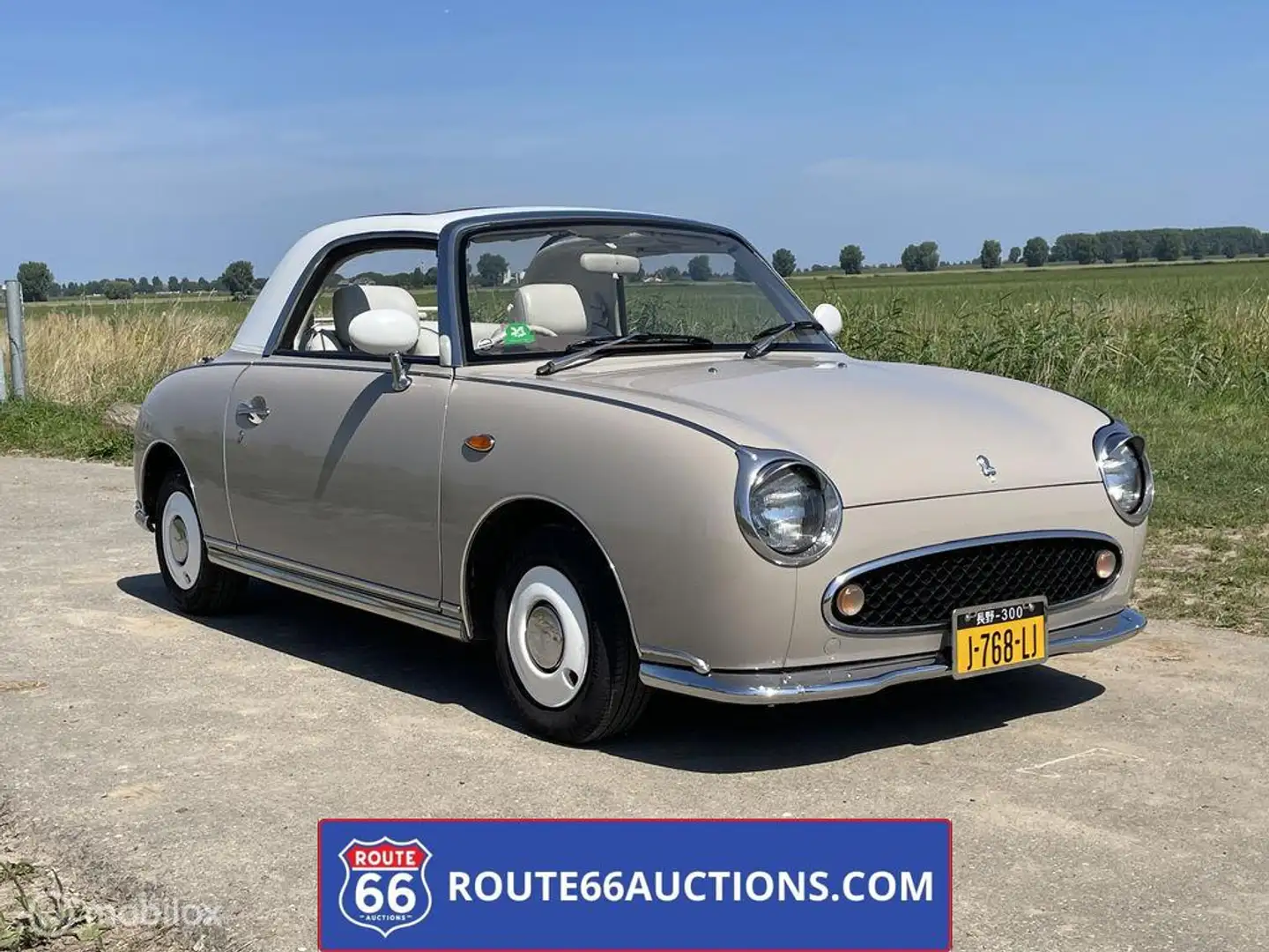 Nissan Figaro | 1991 | Route 66 Auctions Schwarz - 1