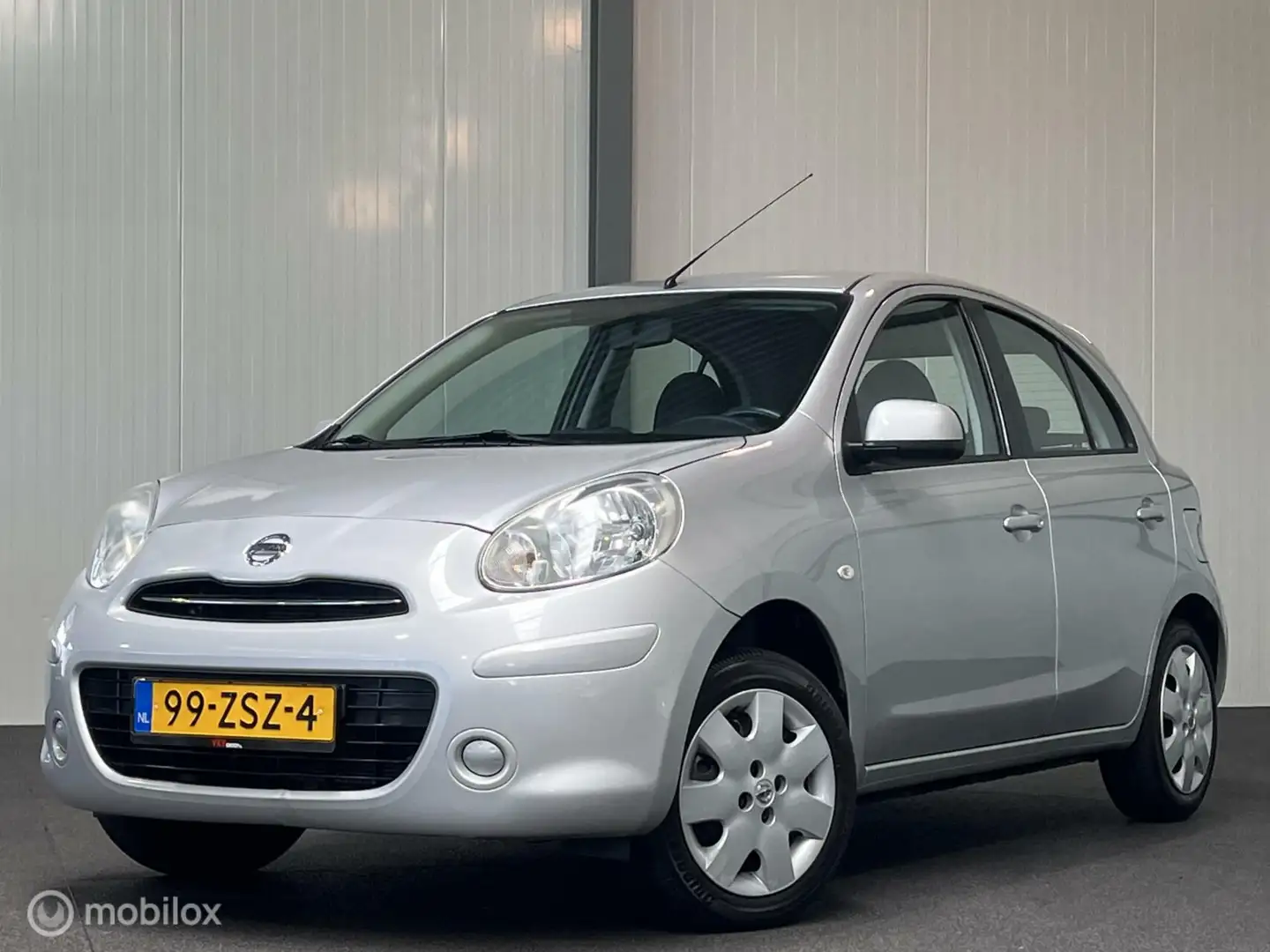 Nissan Micra 1.2 Acenta [ NAP 1e eigenaar airco ] Grijs - 1