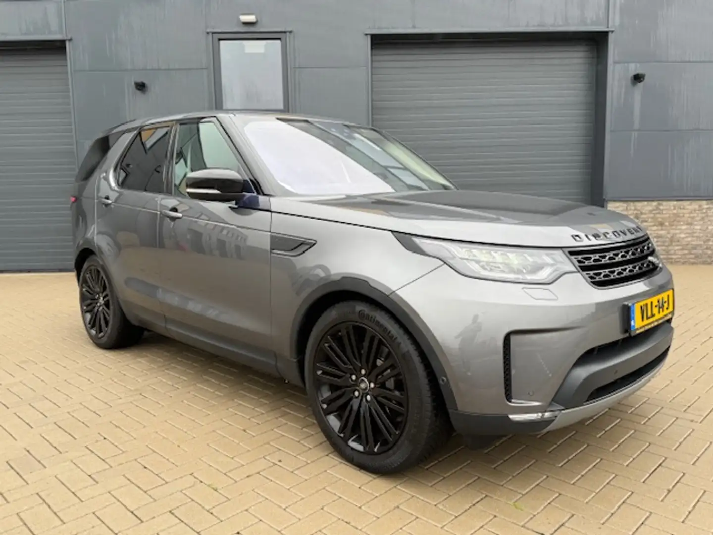 Land Rover Discovery 3.0 Td6 HSE Luxury Trekhaak elektrisch/ Dealer ond Grau - 1