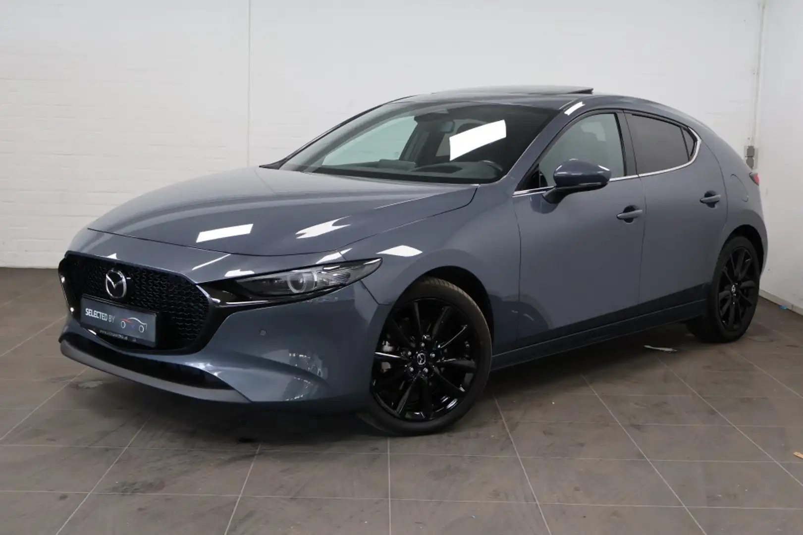 Mazda 3 2.0 e-SA-X Takumi | Schuifdak Grigio - 1