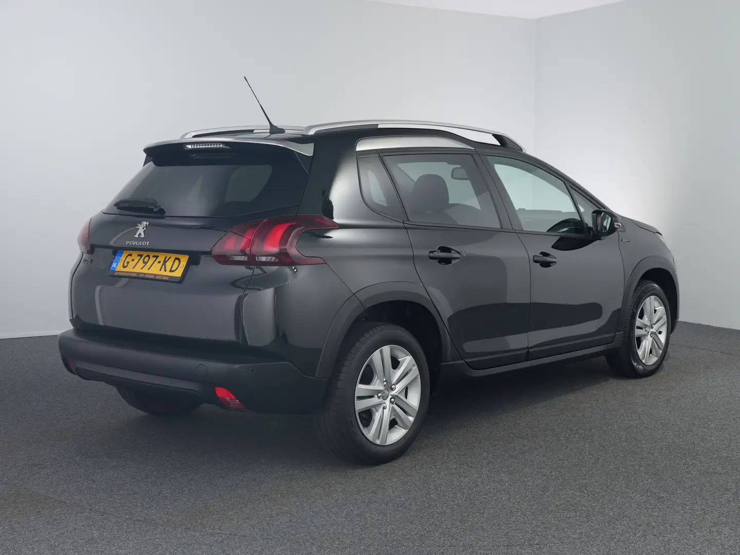 Peugeot 2008 1.2 PureTech Signature | Airco | Cruise control | Noir - 2