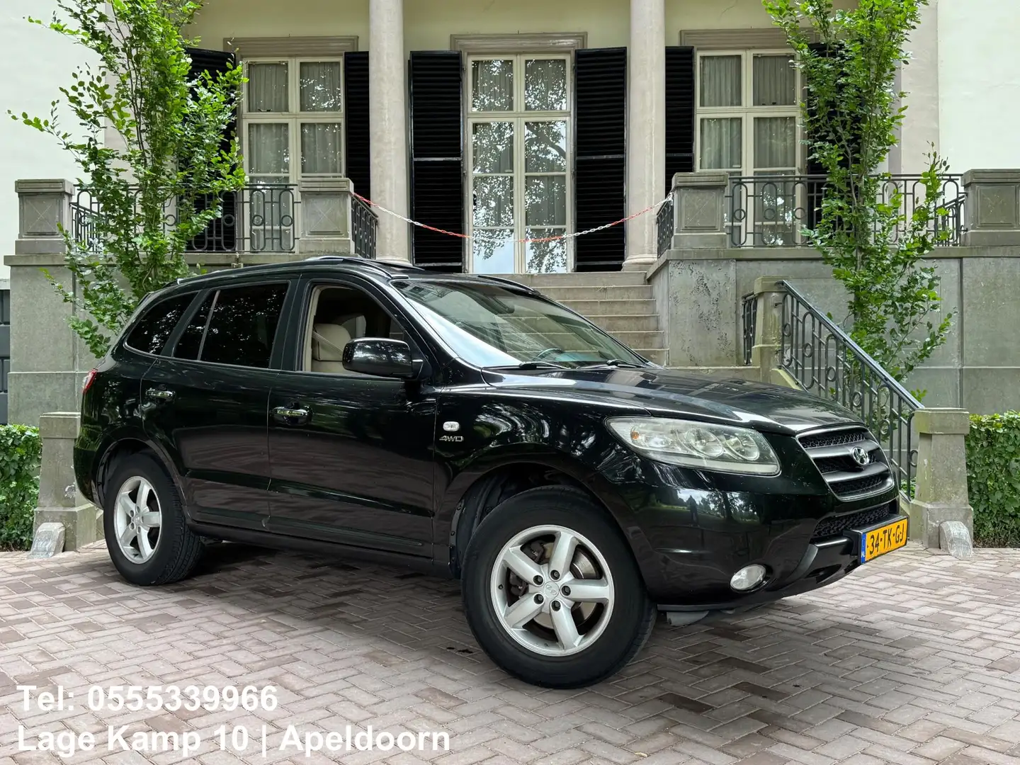 Hyundai SANTA FE 2.7i V6 4WD Style 7p. Automaat Leder Navi Camera P Zwart - 1