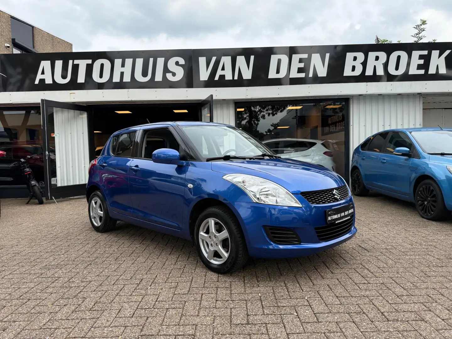 Suzuki Swift 1.2 4X4 5Deurs|1e Eigenaar|Ac|Clima|Stoelverw|Keyl Bleu - 1