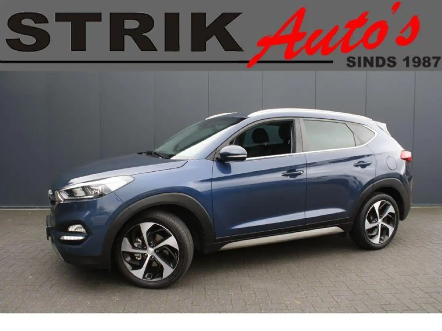 Hyundai TUCSON 1.7 CRDi 141PK HP EURO 6 Premium - NAVIGATIE - CAM Blauw - 1